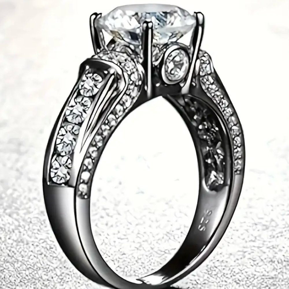 Sterling Silver Genuine Moissanite engagement ring.